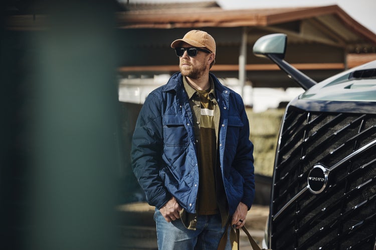 TAT Transport driver next to his truck